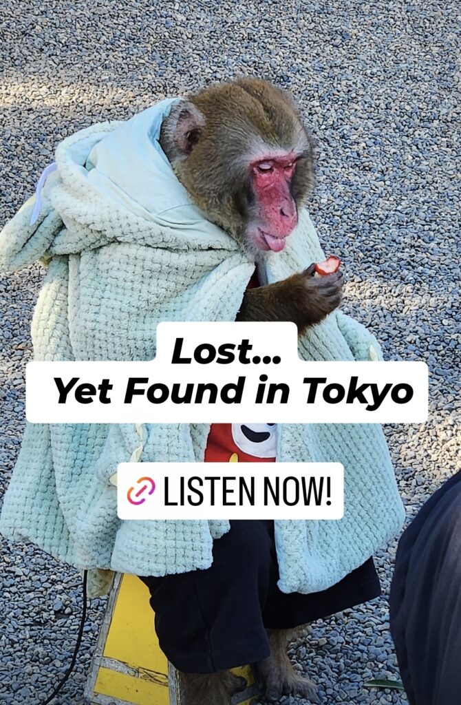 A monkey sitting on a stool eating a strawberry with the words Lost... Yet Found in Tokyo is overlaid, along with a link that reads 'Listen Now!'