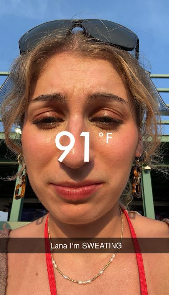 close up selfie of young woman looking upset: the weather is stated at 91 degrees: with a caption stating: LANA I'm sweating.